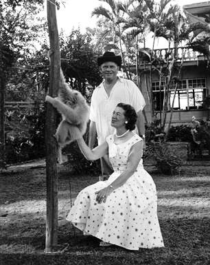 Harold and Ruth with gibbon at Weluwan Villa, original CM Zoo, approx 1956