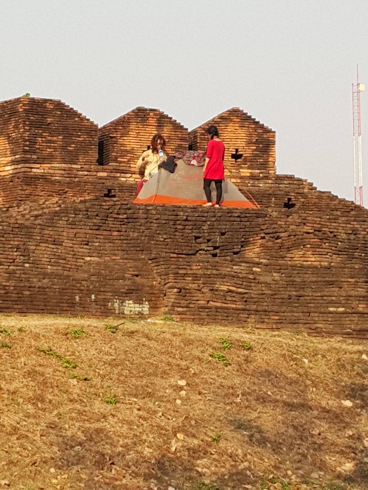 hippy tourists camp on wall 2